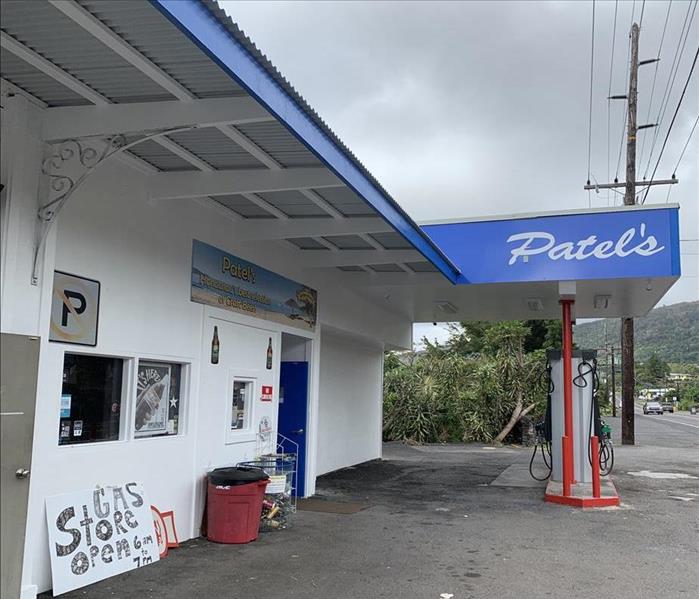 Side of the gas station with doors and windows reconstructed after a fire damage
