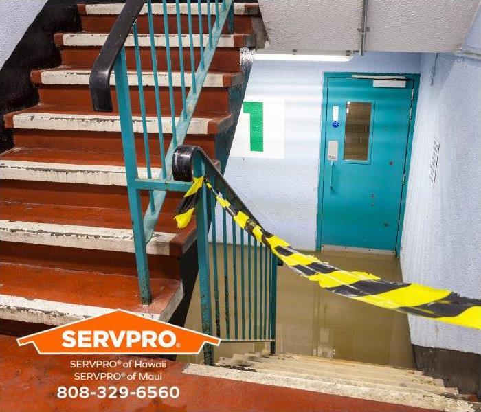 A flooded floor of a commercial property is shown.